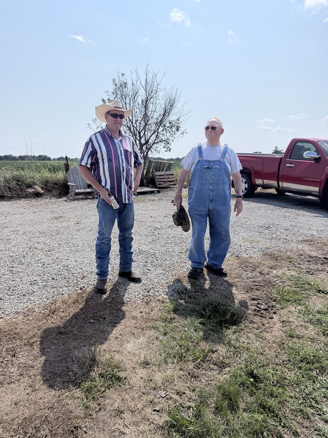 Two people standing together on the property